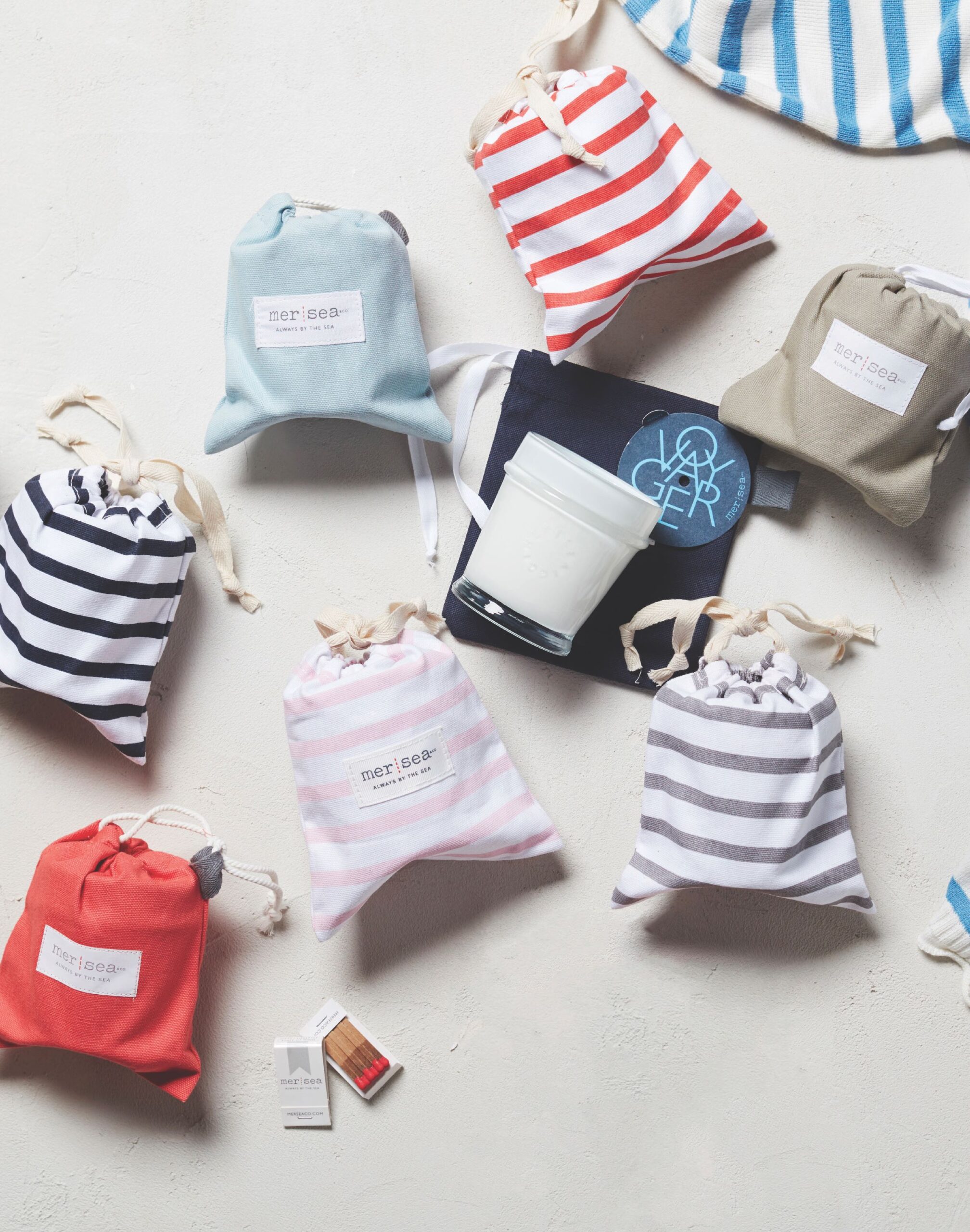 Mer-Sea display of candles in striped bags