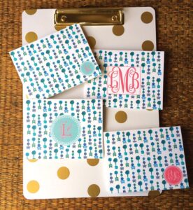 Custom notecards are available with monograms or initials, by Giddy Paperie